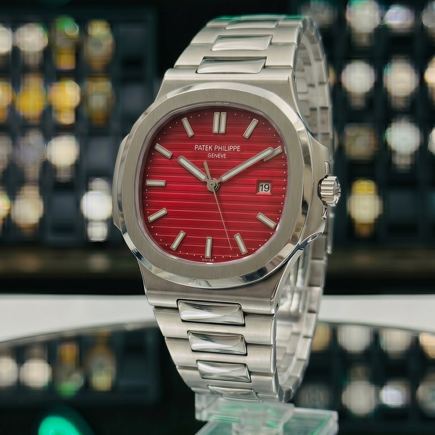 Patek Philippe – Red Dial / Silver Steel Chain