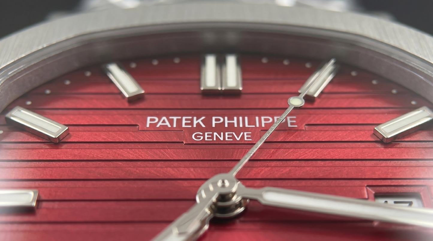 Patek Philippe – Red Dial / Silver Steel Chain