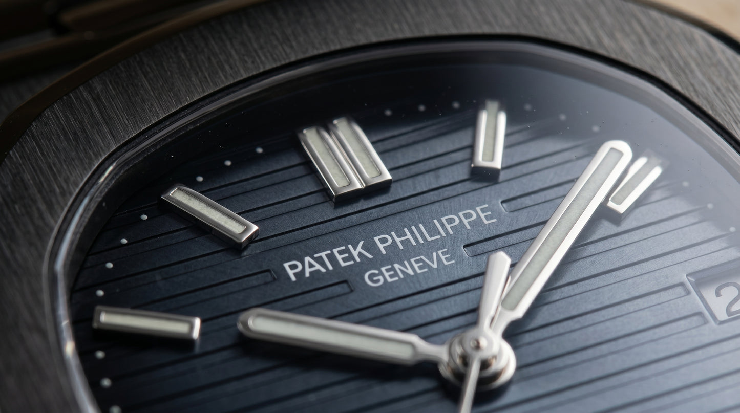 Patek Philippe – Blue Dial / Black Steel Chain