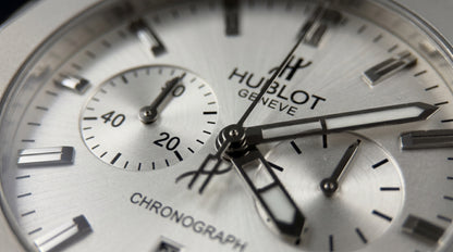 Hublot Diamond Cut Chronograph – White Dial / Silver Chain