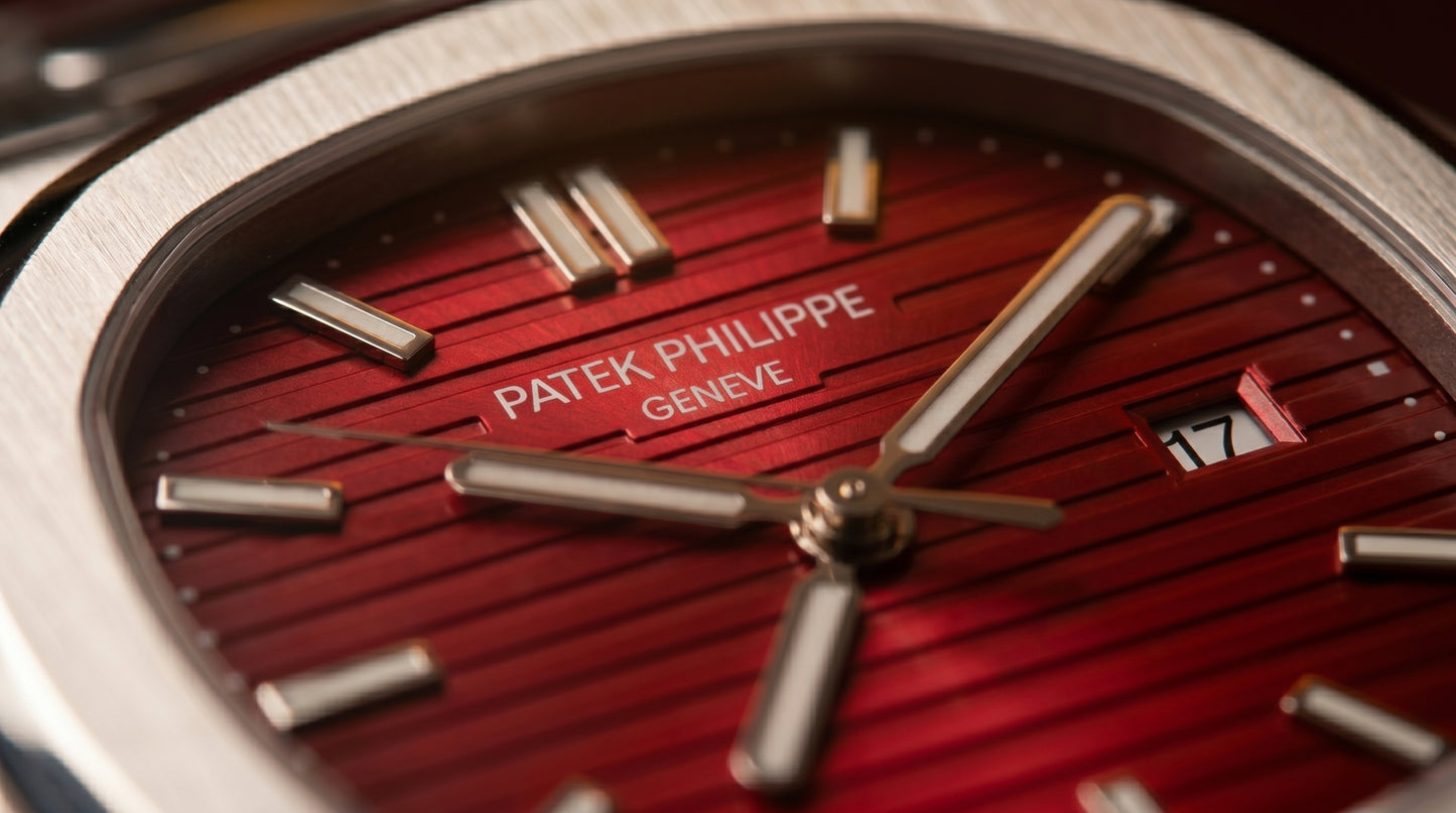 Patek Philippe – Red Dial / Silver Steel Chain